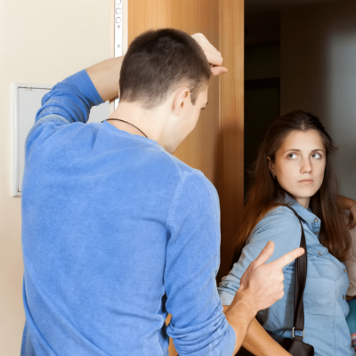 Right-image-5-1 A young man pointing a finger in anger at a young woman who looks annoyed
