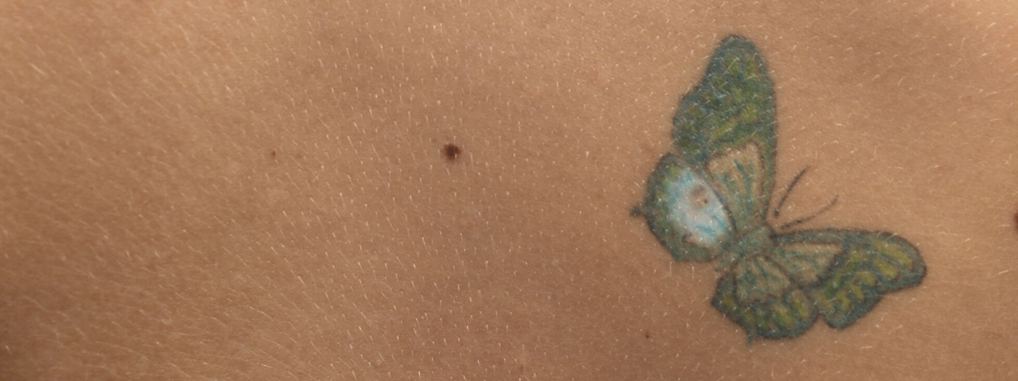 Butterfly tattoo on skin