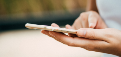 Information a person holding a phone