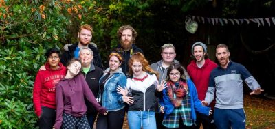 Information Youth worker with group of young people