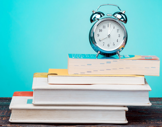 schools_banner showing books and alarm clock
