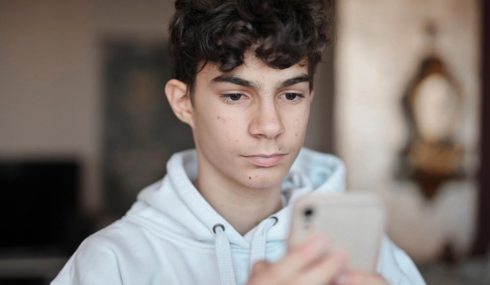 young man using smart phone