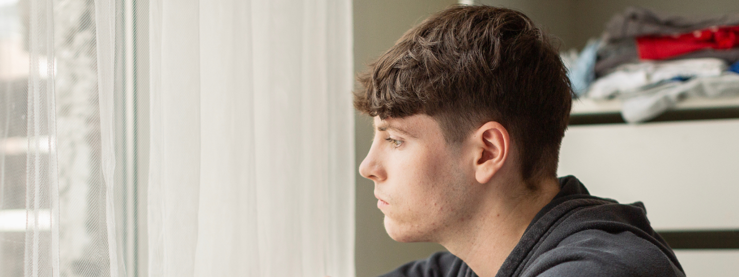 about us YP looking out window